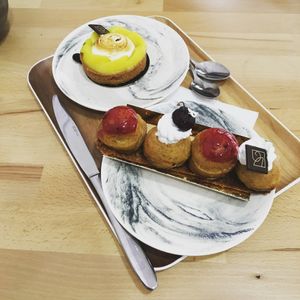 cherry saint honoré and lemon tart  at VG Pâtisserie in Paris