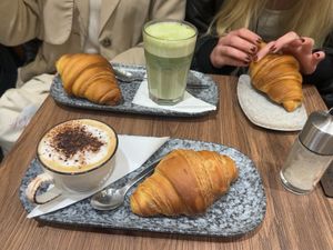 Cappuccino, matcha latte, croissants  at VG Pâtisserie in Paris