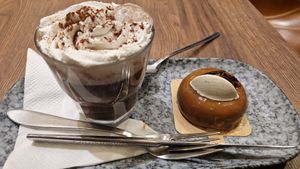 Chocolat chaud au lait d'amande avec de la chantilly + Roxane at VG Pâtisserie in Paris