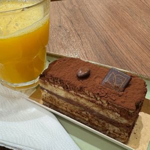 Heavenly light and delicate cake and fresh juice. at VG Pâtisserie in Paris