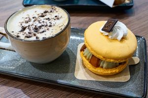 Apricot/Pandan Macaron + Cappuccino at VG Pâtisserie in Paris