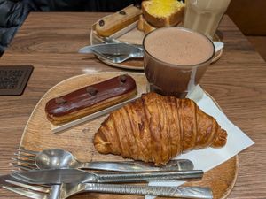 Croissant sandwich, eclair au chocolat, chocolat chaud at VG Pâtisserie in Paris