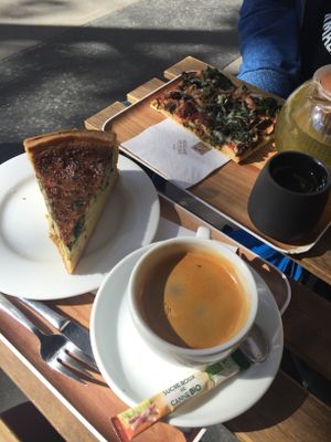 Quiche and pizza for late risers, haha, all croissants were already gone by the time we got there  at VG Pâtisserie in Paris