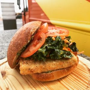 Vegan Coconut Tofu Sandwich with crispy coconut tofu, mango chili kale slaw & basil mayo on a ciabatta roll at WongWayVeg - Food Truck in Denver