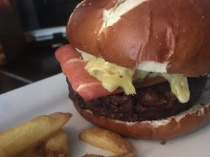 Mac and cheese burger with vegan bacon and smokey ketchup  at The Monument in Canterbury