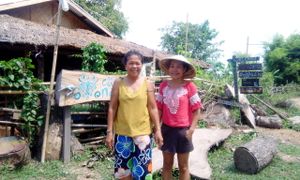Nang and her mother at The Garden of Nang in Don Det