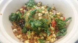 Border Fusion Bowl (has farro, corn, black beans, tomatoes, guacamole and more) at Delicious Raw Kitchen and Juice Bar in Naples