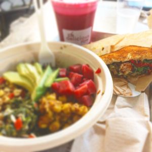 Buddha bowl, pure panino and pink pleasure juice! at Delicious Raw Kitchen and Juice Bar in Naples