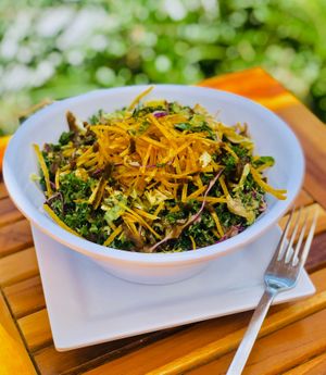 Vie en Vert Salad
A mixture of kale, napa cabbage, romaine and purple cabbage tossed in a pistachio, sweet chili and lemon lime dressing with a touch of mint and topped with crispy at Delicious Raw Kitchen and Juice Bar in Naples