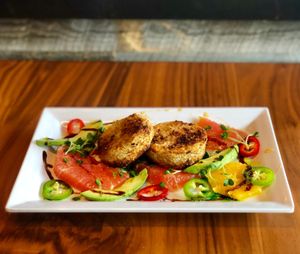 Vivid Croquettes
A vegan duet of our crispy eggplant croquettes, made from scratch and roasted to a golden-brown perfection and served on top of a vibrant and zesty citrus salad at Delicious Raw Kitchen and Juice Bar in Naples