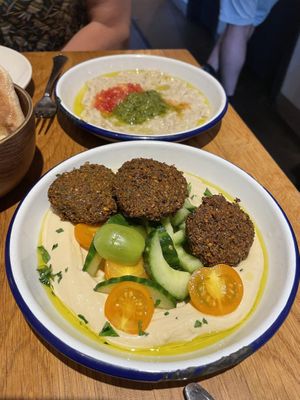 Felafel and hummus, strange aubergine dip behind   at Dobrumba in Budapest