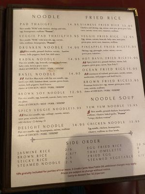 A page of the dinner menu (was advised that the veggie pad Thai,  basil noodle, and spicy veggie noodle can be veganized, as well as several of the fried rice dishes).  at Siam Square in Middletown