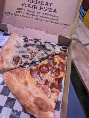 Vegan mushroom pizza and vegan pepperoni pizza at Evel Pie in Las Vegas