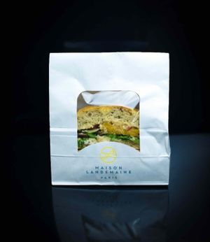 Sandwich made with focaccia bread, baked vegetables and houmous. at Maison Landemaine in Levallois-perret