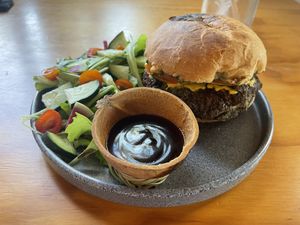 Hamburger and greens  at Chula in San Jose Del Cabo