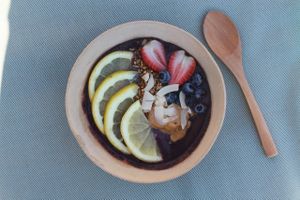 Acial bol with orange,straberry,blueberry,peanutbutter,coconut and granola at Chula in San Jose Del Cabo