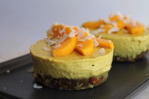 Raw vegan cashew butter with a little bit of cúrcuma cake!! served with mango and coconut , so refreshing!  at Chula in San Jose Del Cabo