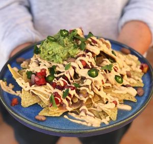 Vegan Nachos! Cashew cheese , beans , pico de gallo and serrano :) yuuuum  at Chula in San Jose Del Cabo