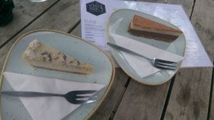 Raw lemon cheesecake and raw tiramisu cheesecake, both vegan. Expensive but amazing. at Vondelpark3 in Amsterdam