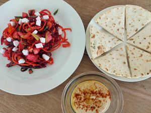 Hummus, pita bread and beet/carrot salad with greek white cheese. at Vida Lotus in Limon Campana Capira