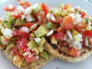 Arepas with tomato, avocado, onion at Vida Lotus in Limon Campana Capira