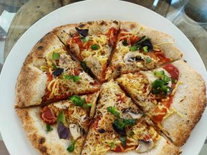 Neopolitan style pizza with tomato and basil at Vida Lotus in Limon Campana Capira