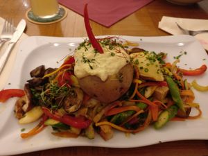 Tofu with baked potatoe, asparagus and veggies at Stiftskeller in St Florian