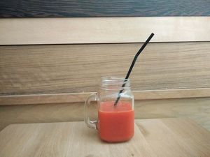 ";orange"; juice made with carrots, oranges, cherries and ginger at La Colectiva Cafe in Madrid