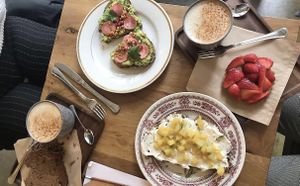 Toasts, chai’s, fruit tart and bizcocho at La Colectiva Cafe in Madrid