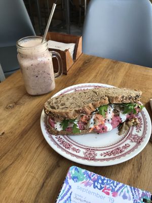 Purple smoothie and hummus and mushroom sandwich. Both awesome  at La Colectiva Cafe in Madrid