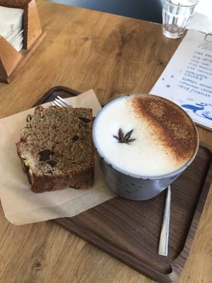 Chai tea latte and banana bread  at La Colectiva Cafe in Madrid