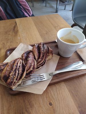 Espresso and walnut/cinnamon sweet at La Colectiva Cafe in Madrid