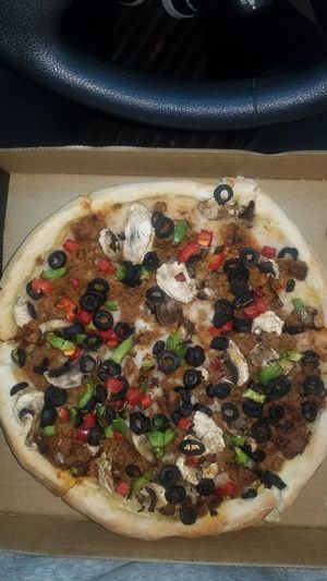 Deep dish with vegan sausage and vegan cheese. at Zaucer Pizza in Redmond