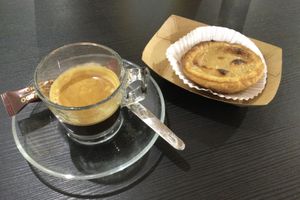 coffee with vegan pastel de nata  at Vegana By Tentúgal in Porto