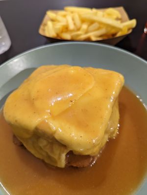 Francesinha with fries at Vegana By Tentúgal in Porto