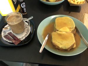 Tofu and grilled cheese toast with extra Francesinha sauce and cheese   at Vegana By Tentúgal in Porto