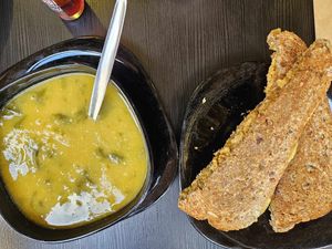 Cream of the day with smoked saucisses grilled cheese at Vegana By Tentúgal in Porto