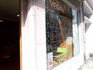 View from the street (thin sidewalk) at Vegana By Tentúgal in Porto