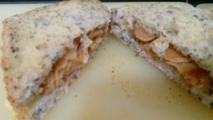 Traditional sandwich with cheese, ham and vegan meat at Vegana By Tentúgal in Porto