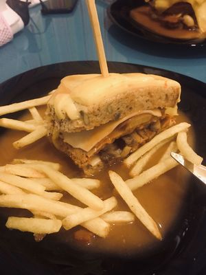 Francesinha with fried potatos at Vegana By Tentúgal in Porto