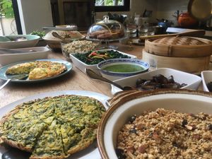 Vegan frittata beside the granola. Amazing arugula pesto, too! at Simone's Kitchen in Antwerpen