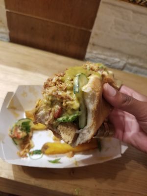 Added lots of jalapeno sauce. at Munchies Hot Dog in Madrid