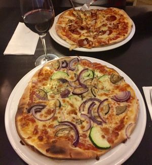 Vegan pizza Leonardo (bottom) and vegan wine   at Novecento in Haarlem