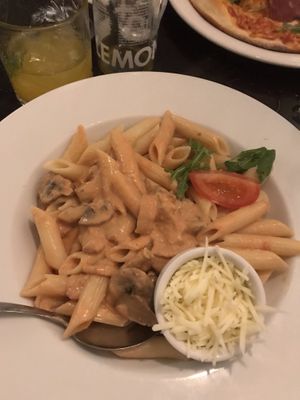 Vegan tomato cream pasta with bacon and mushrooms at Novecento in Haarlem