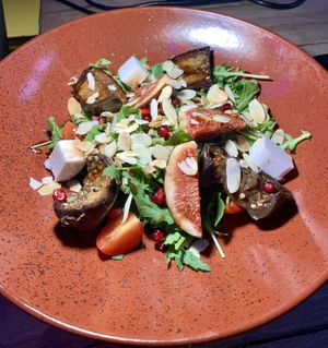 Salad with figs and glazed eggplant at OM NOM NOM in Lviv