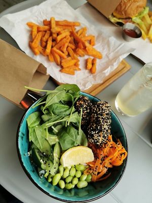 Bowl with tofu, edamame beans and vegetables at OM NOM NOM in Lviv