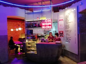 Inside, in the evening at OM NOM NOM in Lviv
