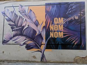 Mural outside om nom nom at OM NOM NOM in Lviv