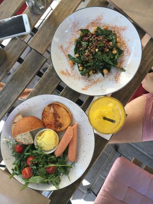 Salad and American breakfast  at OM NOM NOM in Lviv