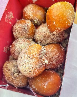 Chocolate filled, topped with hazelnuts   at Lukumades in Athens